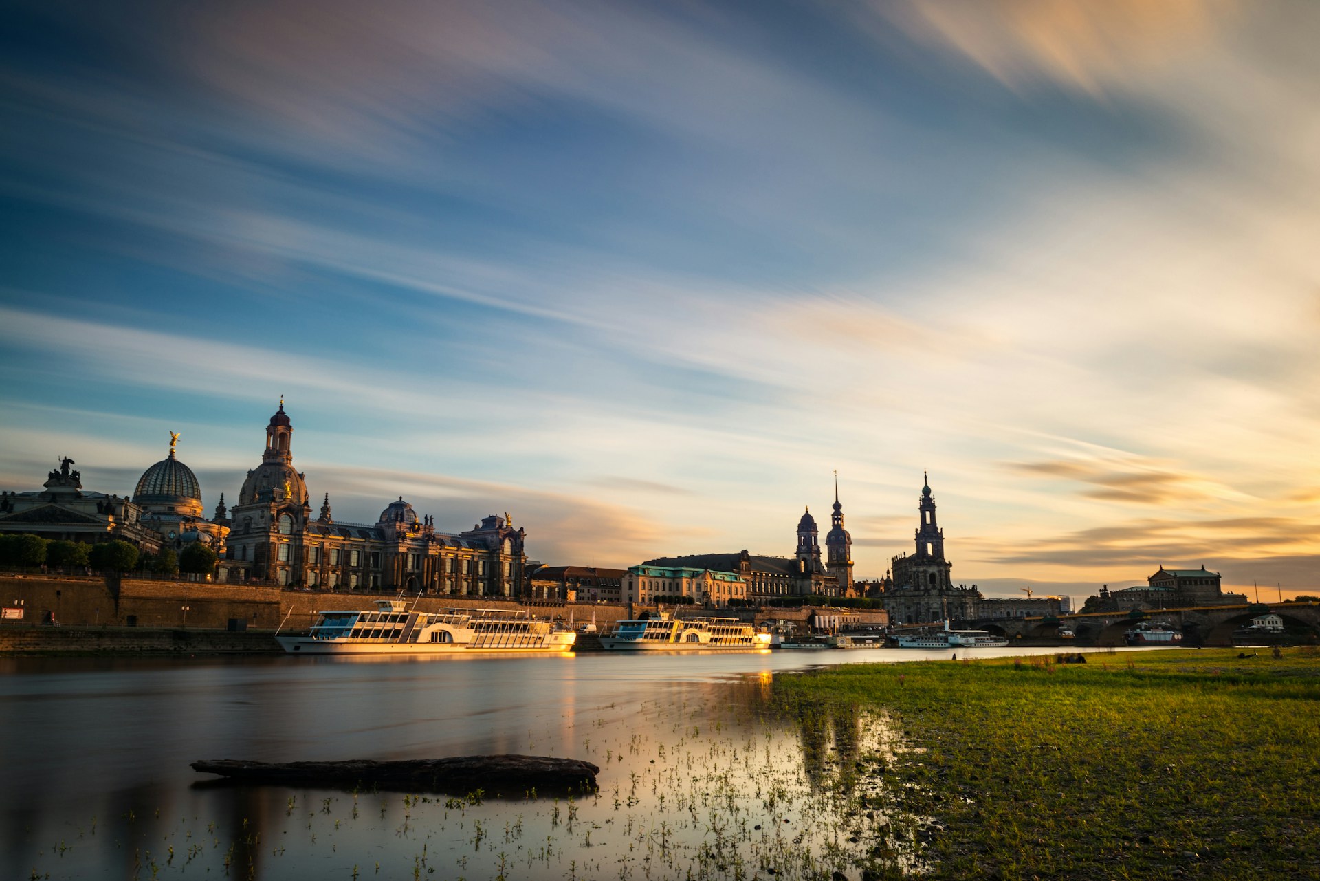 Dresden old town and Elbe riverbank at sunset.